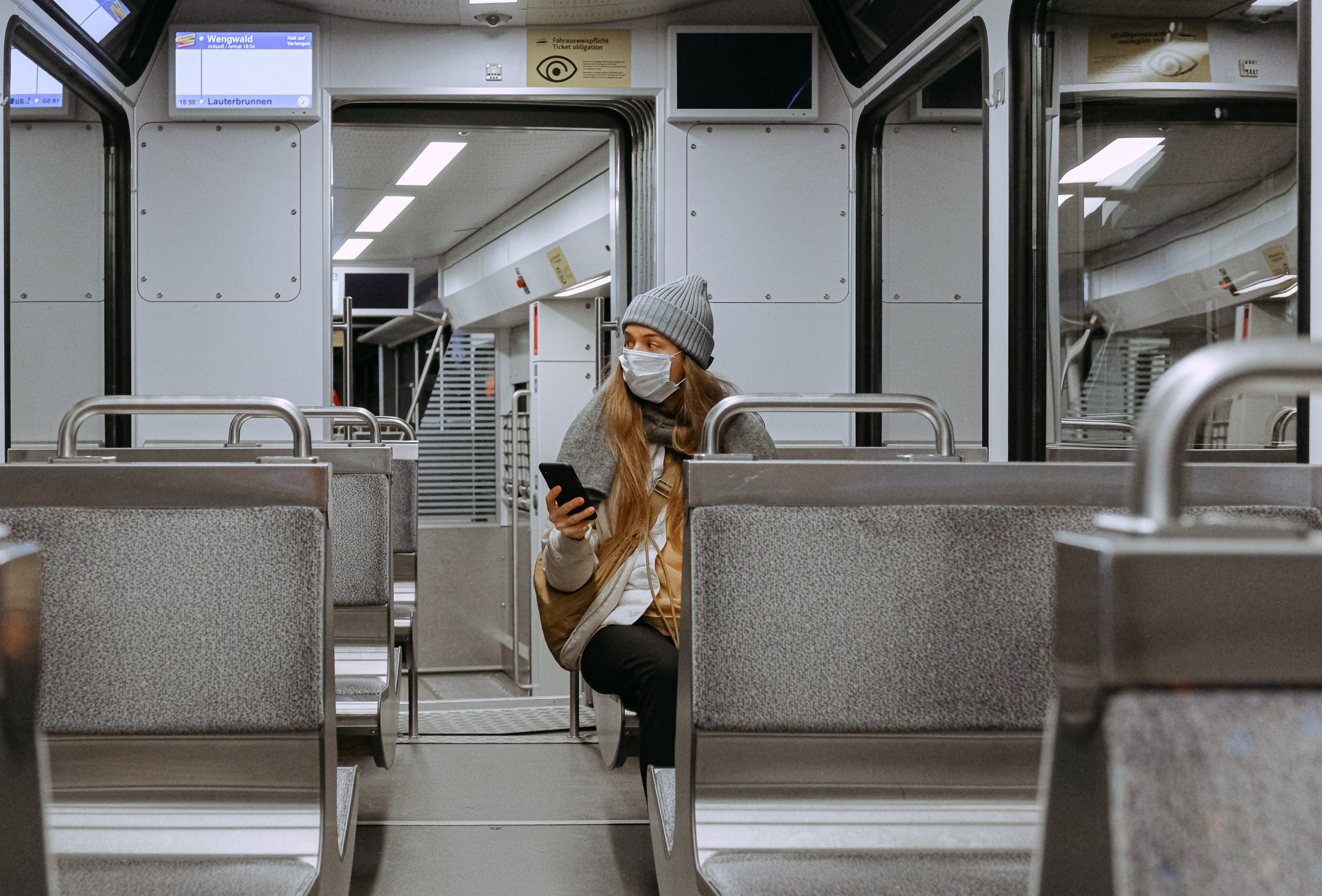 Masked Student on Train